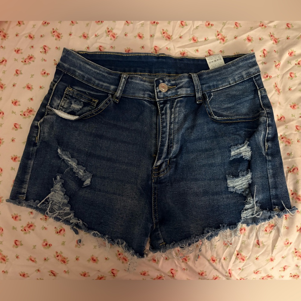 Mini distress blue jeans